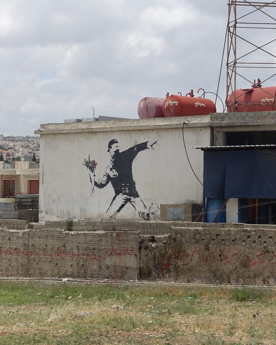 "Banksy - 'Rage, Flower Thrower'" by jensimon7 is licensed under CC BY 2.0