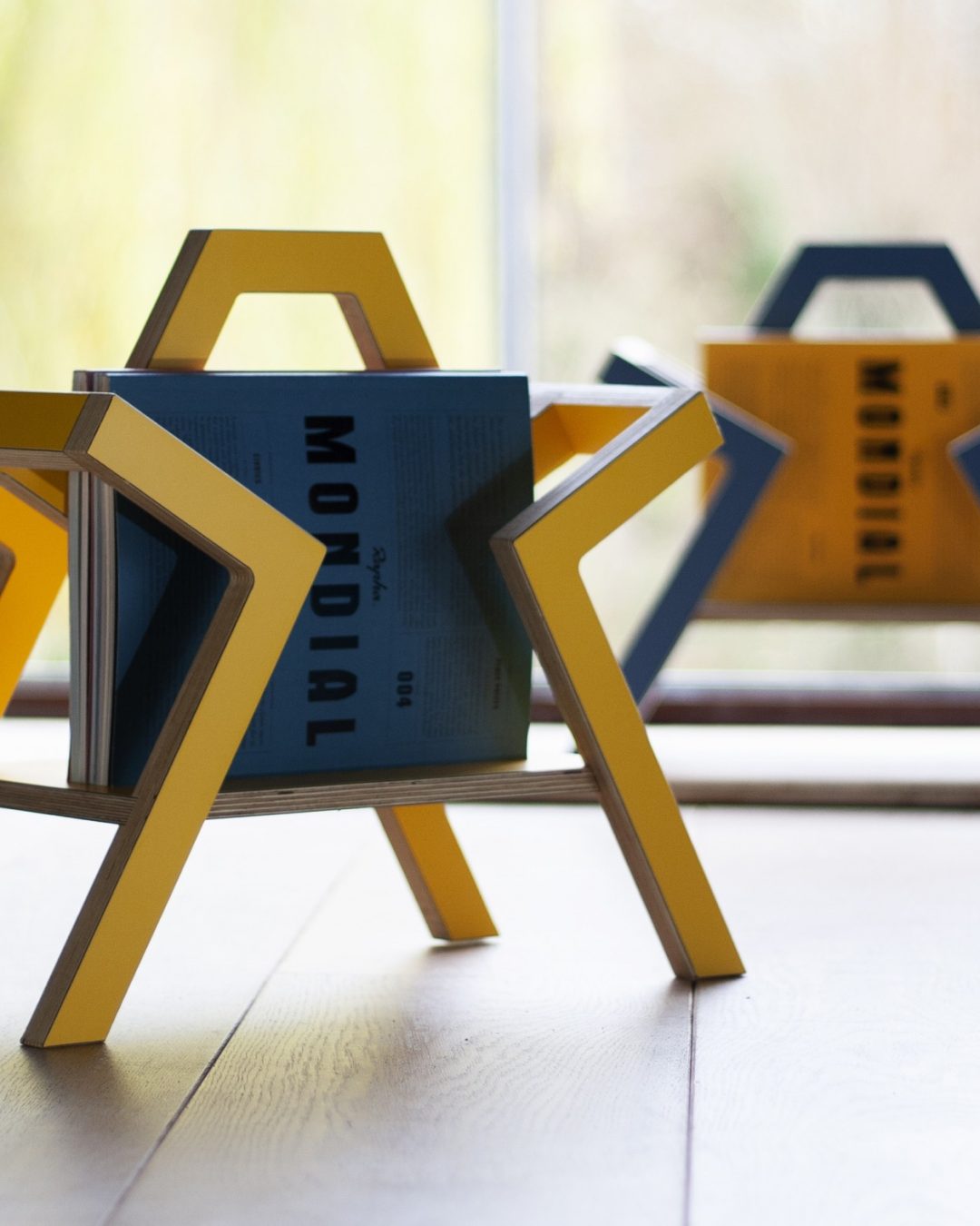 Charlie Caffyn_Farleigh Colour Magazine Holder in Denim Blue & Spectrum Yellow_from £99